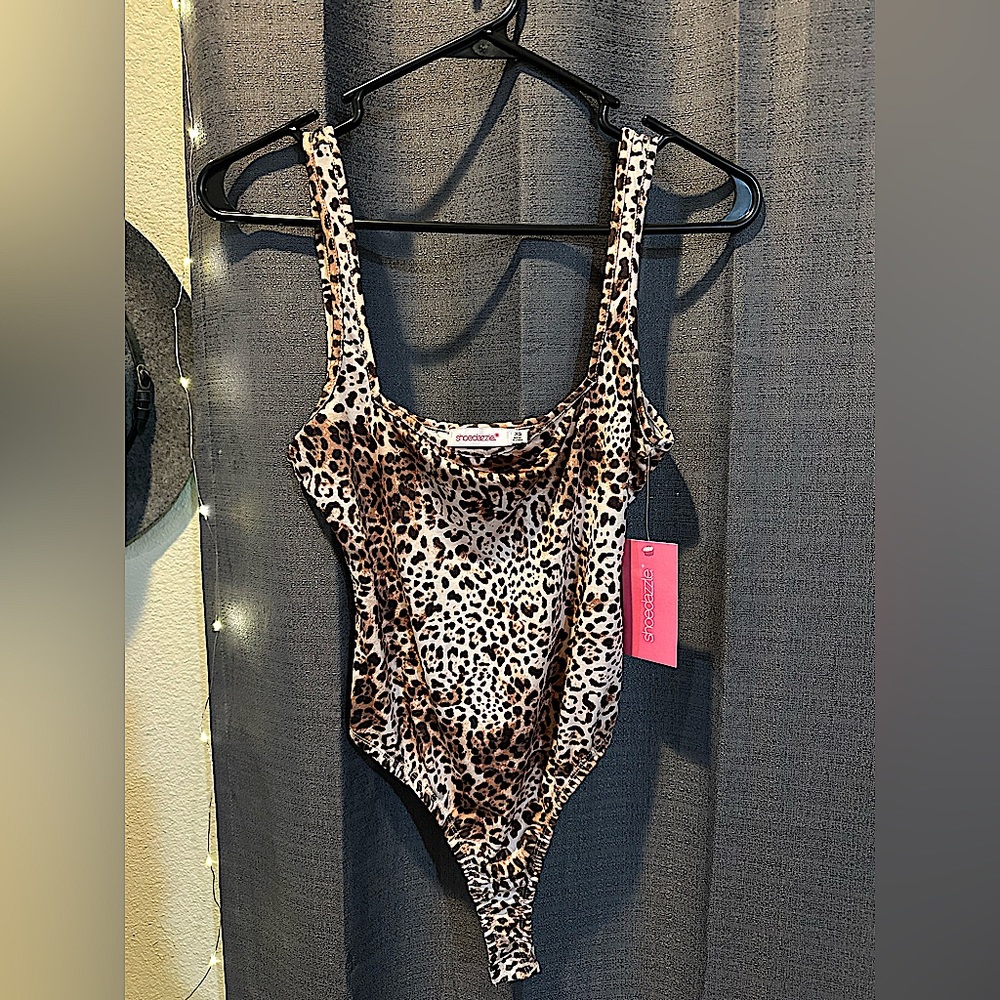 XS square neck leopard body suit - never been worn. Tags still on